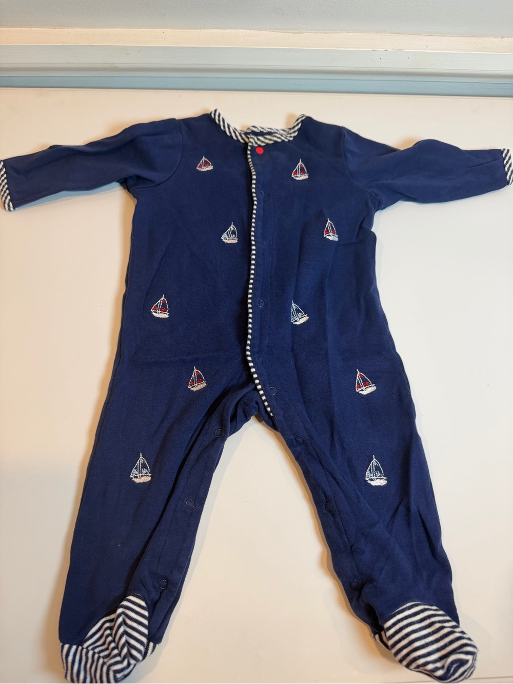 Little Me Navy footed onesie with sailboats